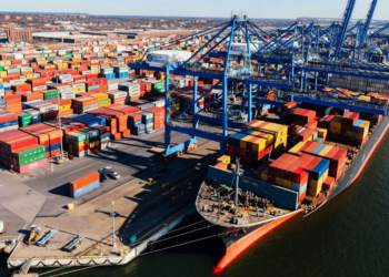 Smart Freight Planning for Growing E-commerce or Retail StoresImage Alt text: Cargo ship loading at port